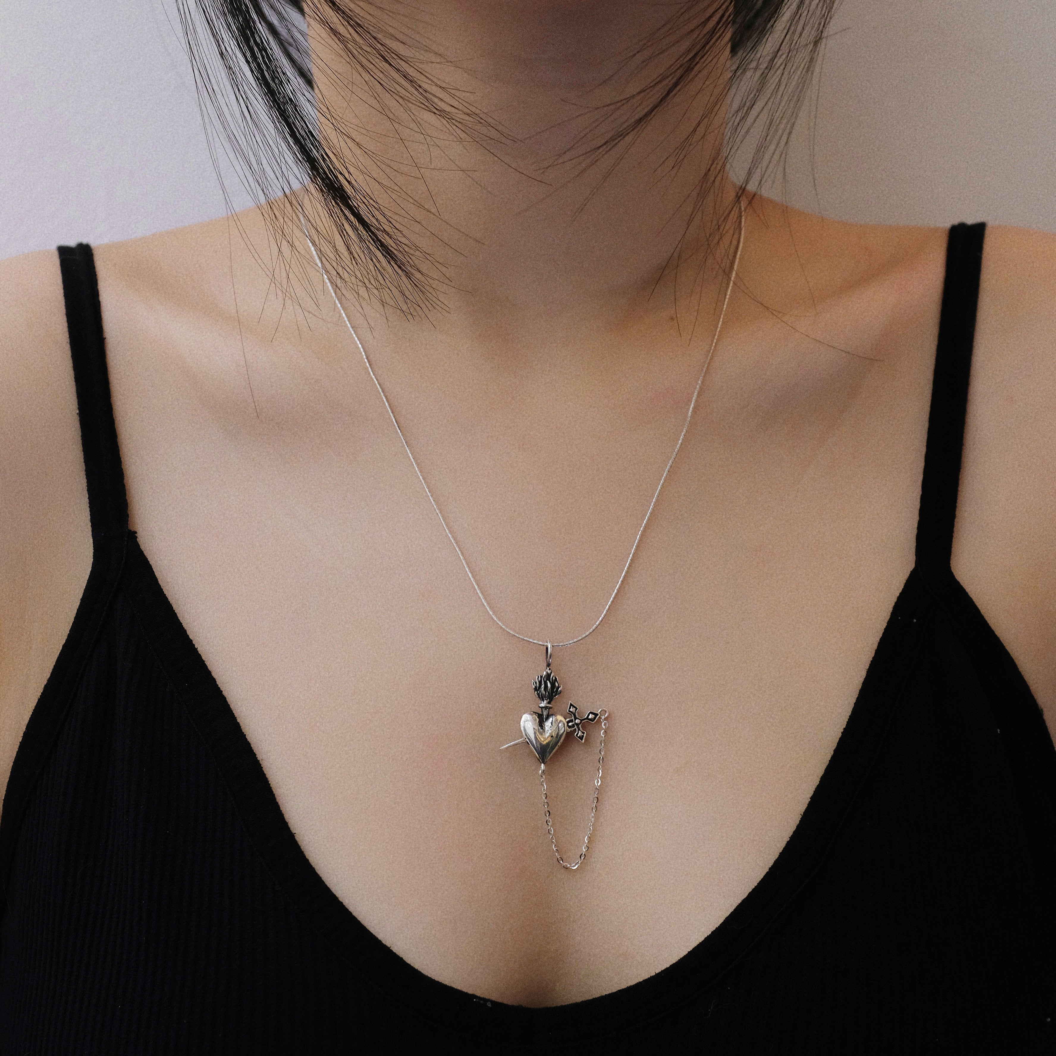 Sword-Pierced Silver Heart Pendant